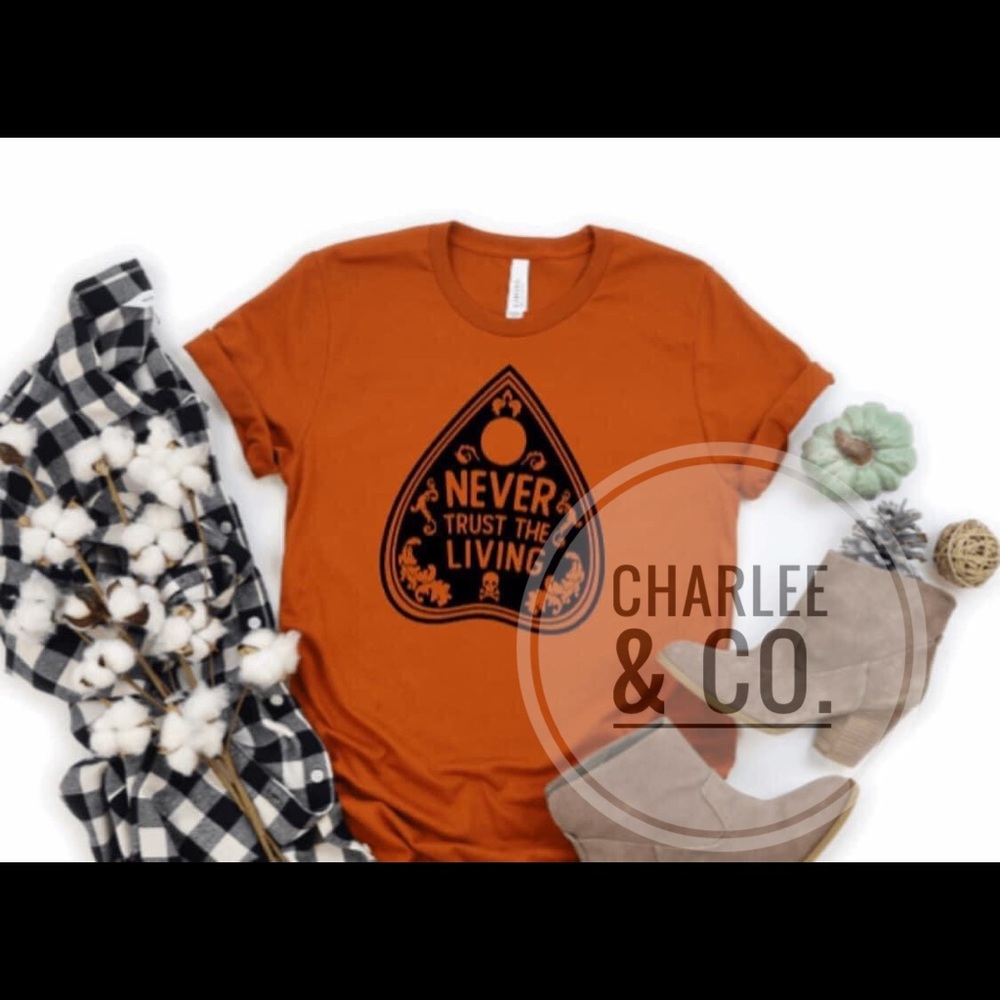 Never Trust the Living Graphic Tee